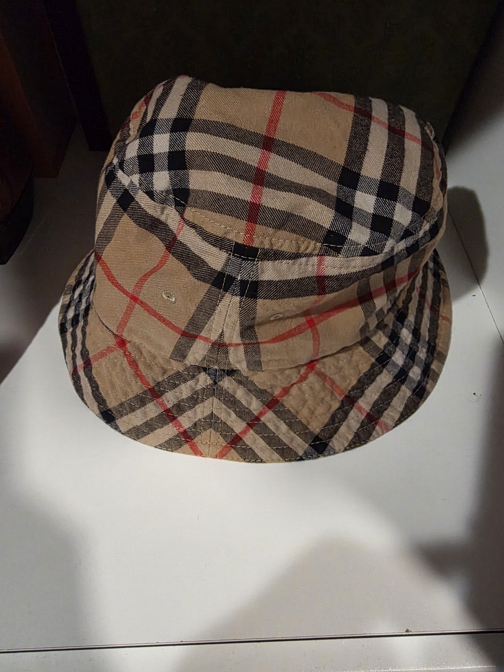Burberry Beige Plaid Bucket Hat with Black and Red Accents